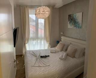 Апартаменты Butterfly Apartman Рафаиловичи Апартаменты с 1 спальней-64