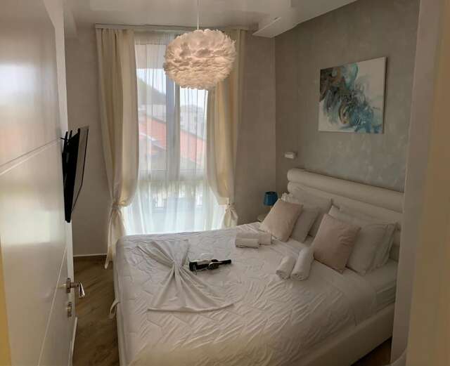 Апартаменты Butterfly Apartman Рафаиловичи-12