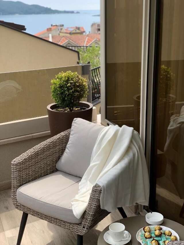 Апартаменты Butterfly Apartman Рафаиловичи-16